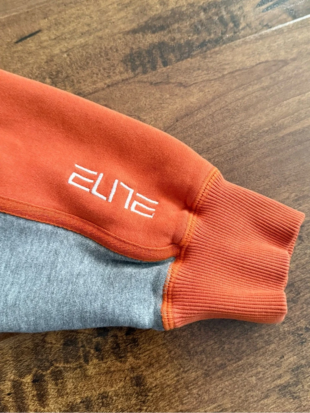 Nike Orange Half-Zip Hoodie with Black Zipper Accents